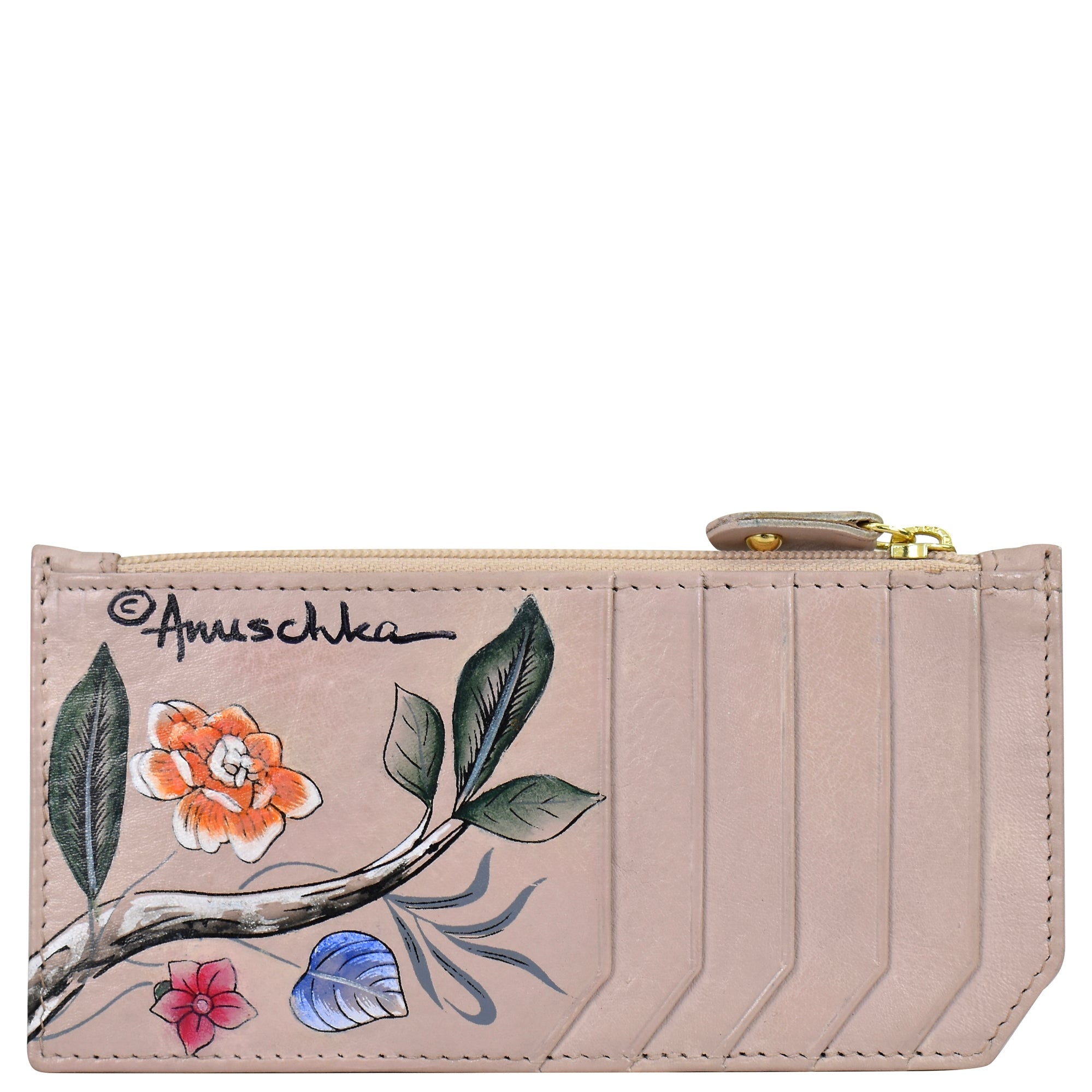 The Anuschka RFID Blocking Card Case with Coin Pouch - 1140 is a sleek, beige cardholder made from genuine leather and showcases a painted floral design with the brand name "Anuschka" on the top left. It includes vertical card slots, RFID protection, and a zipper closure on the top.