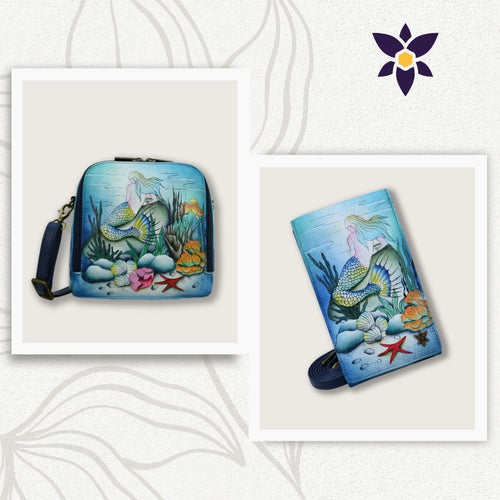 Image of Anuschka's Bundle of Zip Around Travel Organizer with Smartphone Crossbody - 668-1154. Both items feature hand painted original artwork with a mermaid design and underwater flora and fauna. The genuine leather handbag is square with a strap, while the rectangular wallet includes RFID protection.