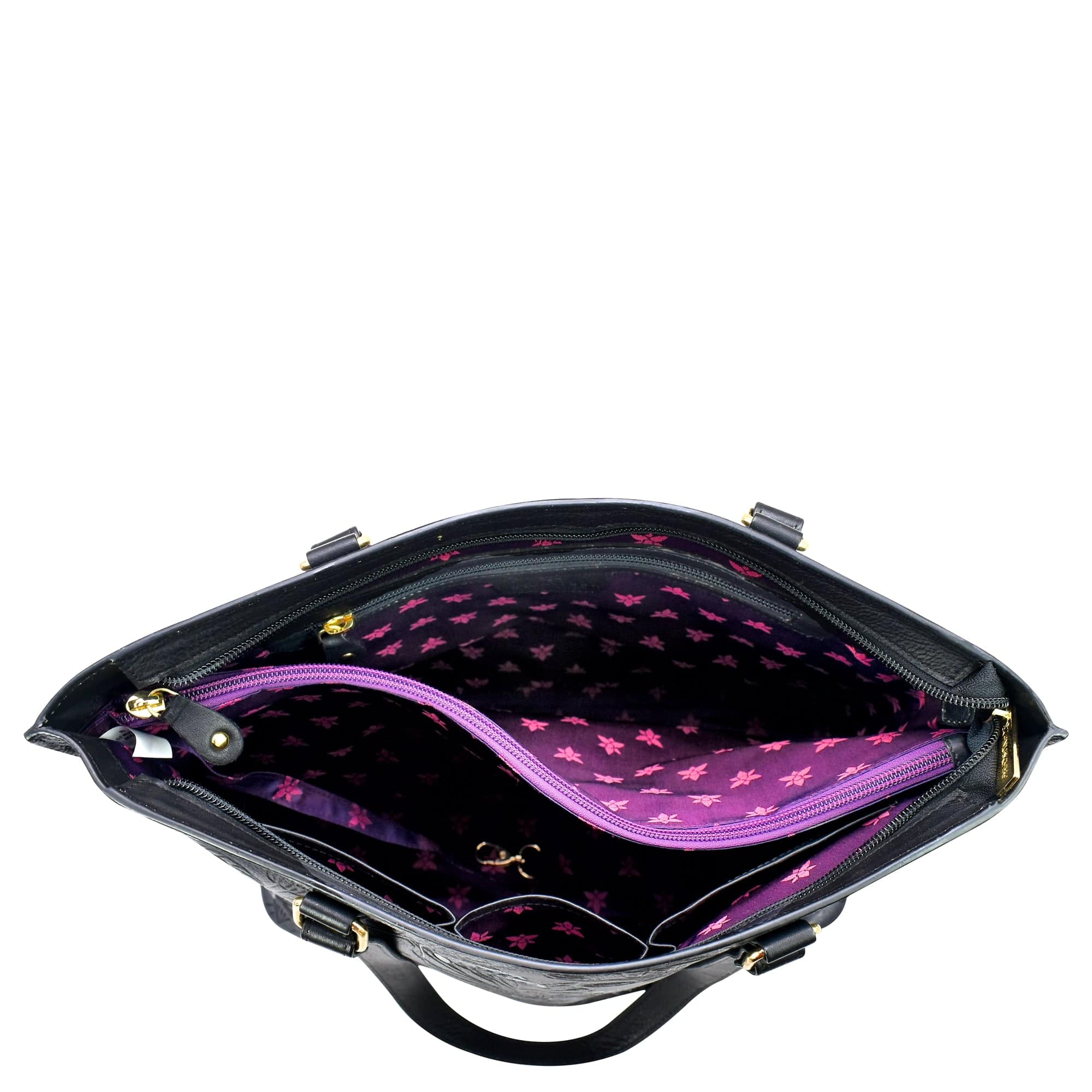 Open Anuschka large zip top tote - 698 with a visible purple star-patterned interior.