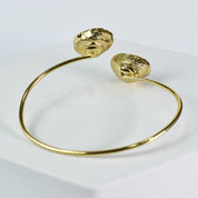 Druzy Melody Bracelet by Vanya Lara with textured end caps on a white background.