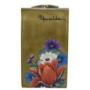 A vertically-oriented gold leather Double Eyeglass Case - 1009 featuring a hand-painted floral design with red, white, purple, and blue flowers. The brand "Anuschka" is signed in black at the top.