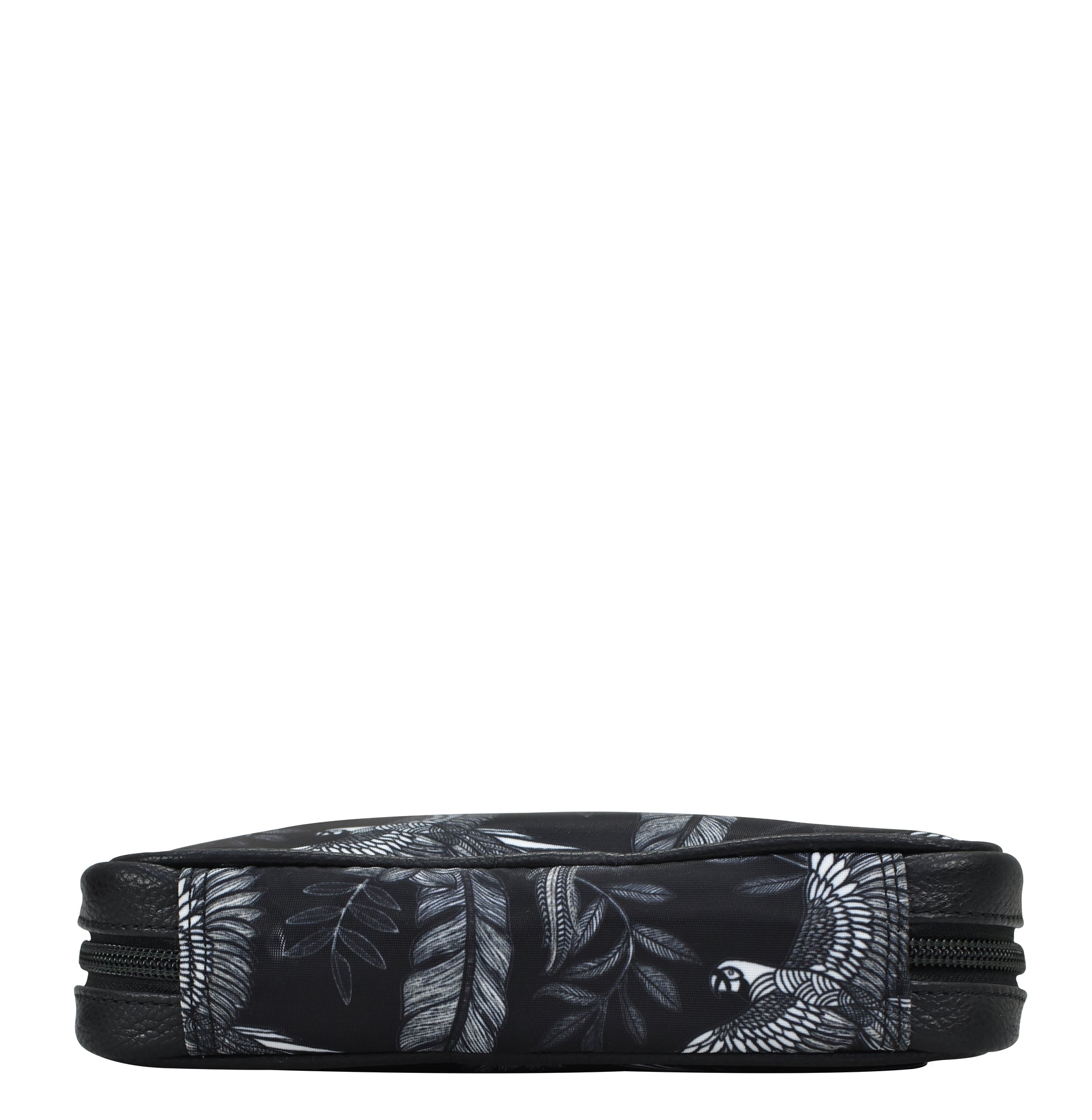 Black toiletry bag with expandable pockets and leaf print design with zipper closure.
Product Name: Anuschka Fabric with Leather Trim Travel Jewelry Organizer - 13003
