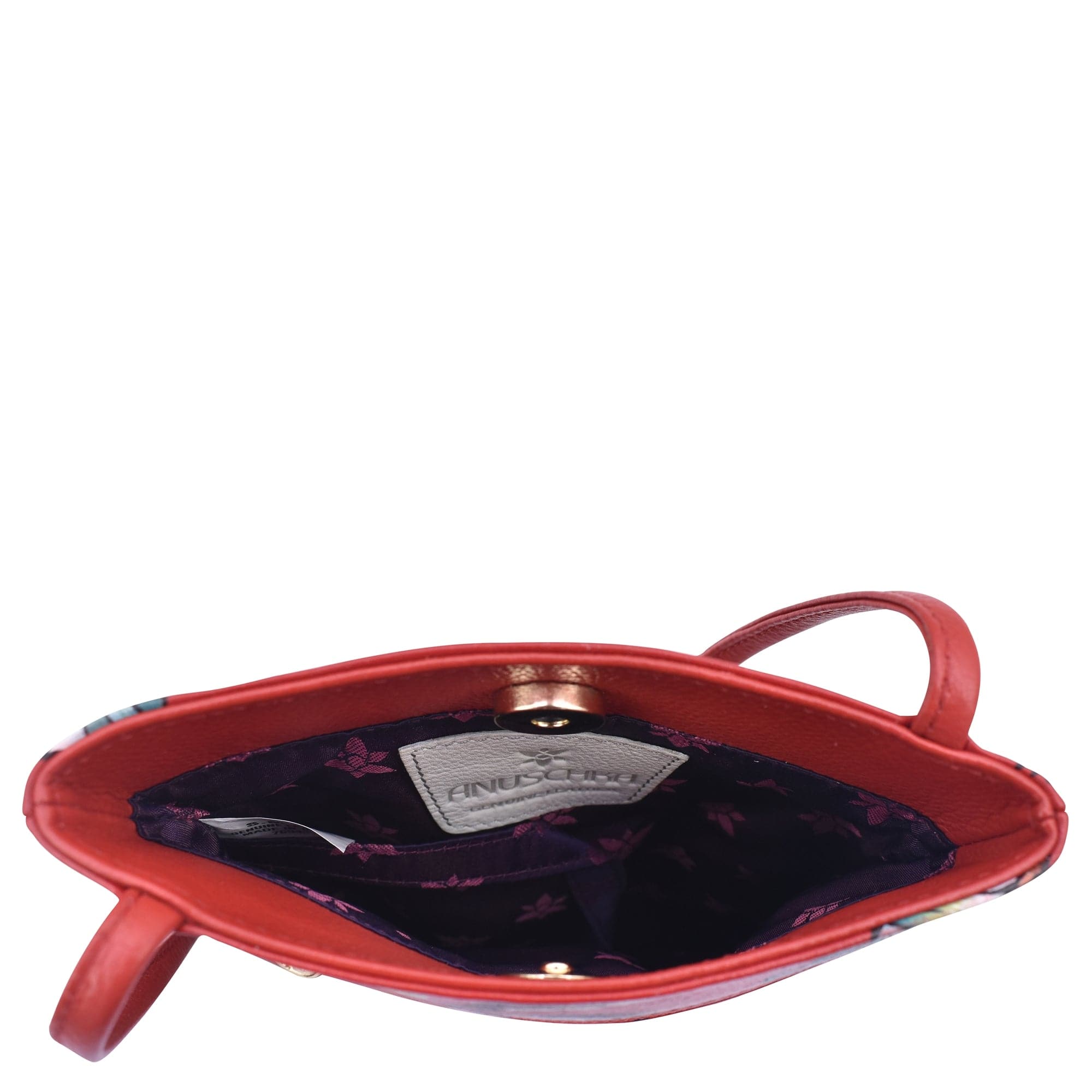 Open Mini Double Zip Travel Crossbody - 448 handbag in orange leather with a floral interior lining shown from a top-down perspective against a white background by Anuschka.