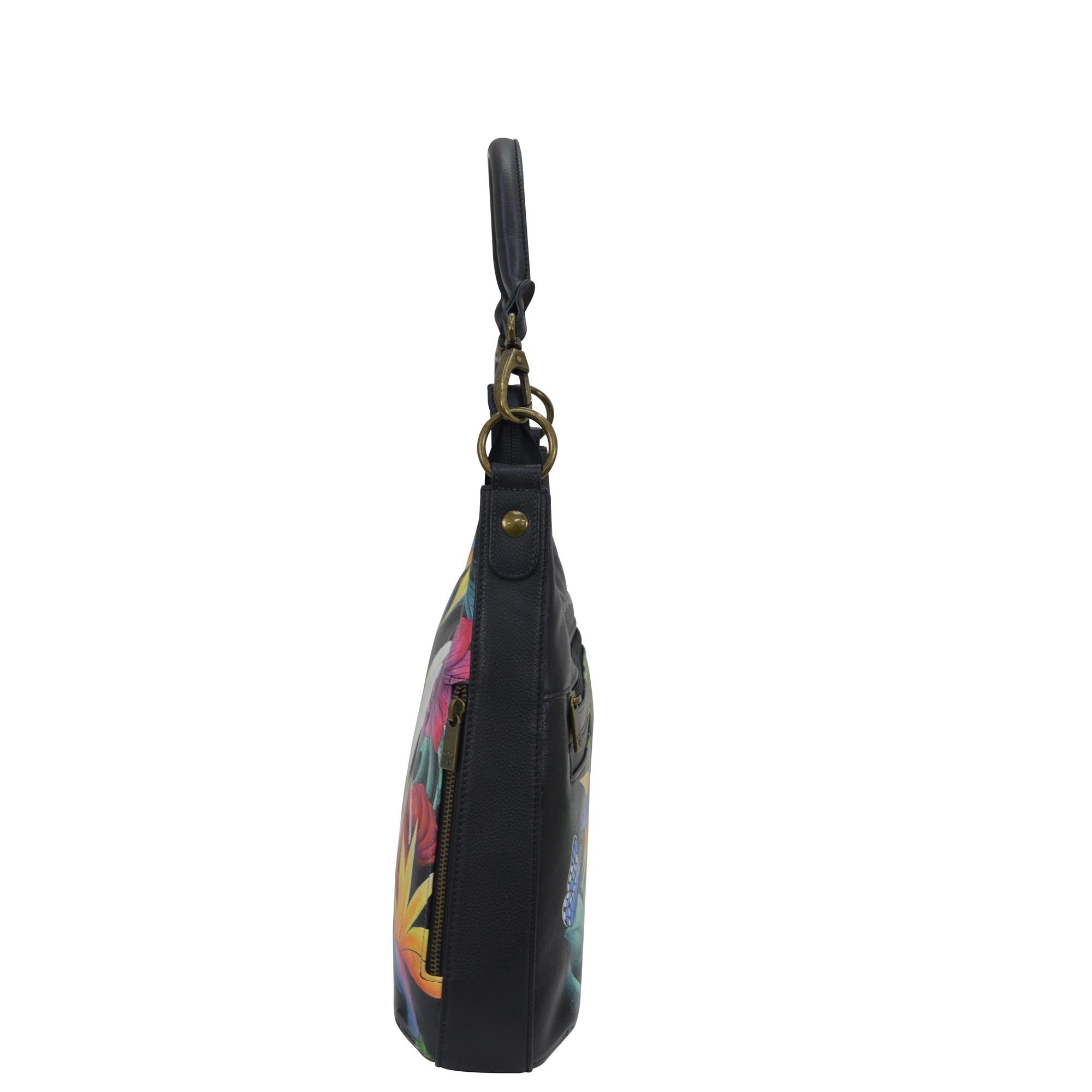 Side view of a Anuschka Convertible Slim Hobo With Crossbody Strap - 662 with a zipper closure and an adjustable crossbody strap.