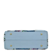 Blue floral-print leather Anuschka Multi Compartment Satchel - 690 on a white background.