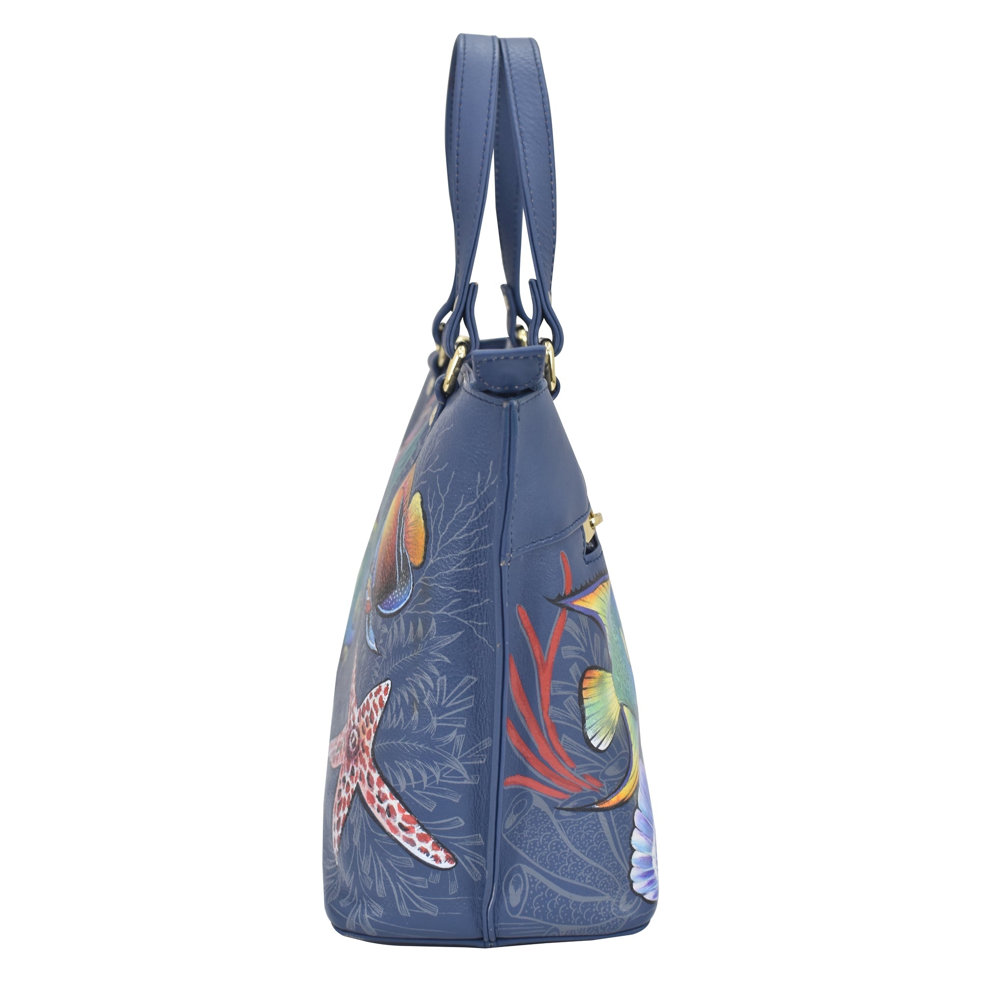 Blue genuine leather Anuschka handbag with marine life print design.