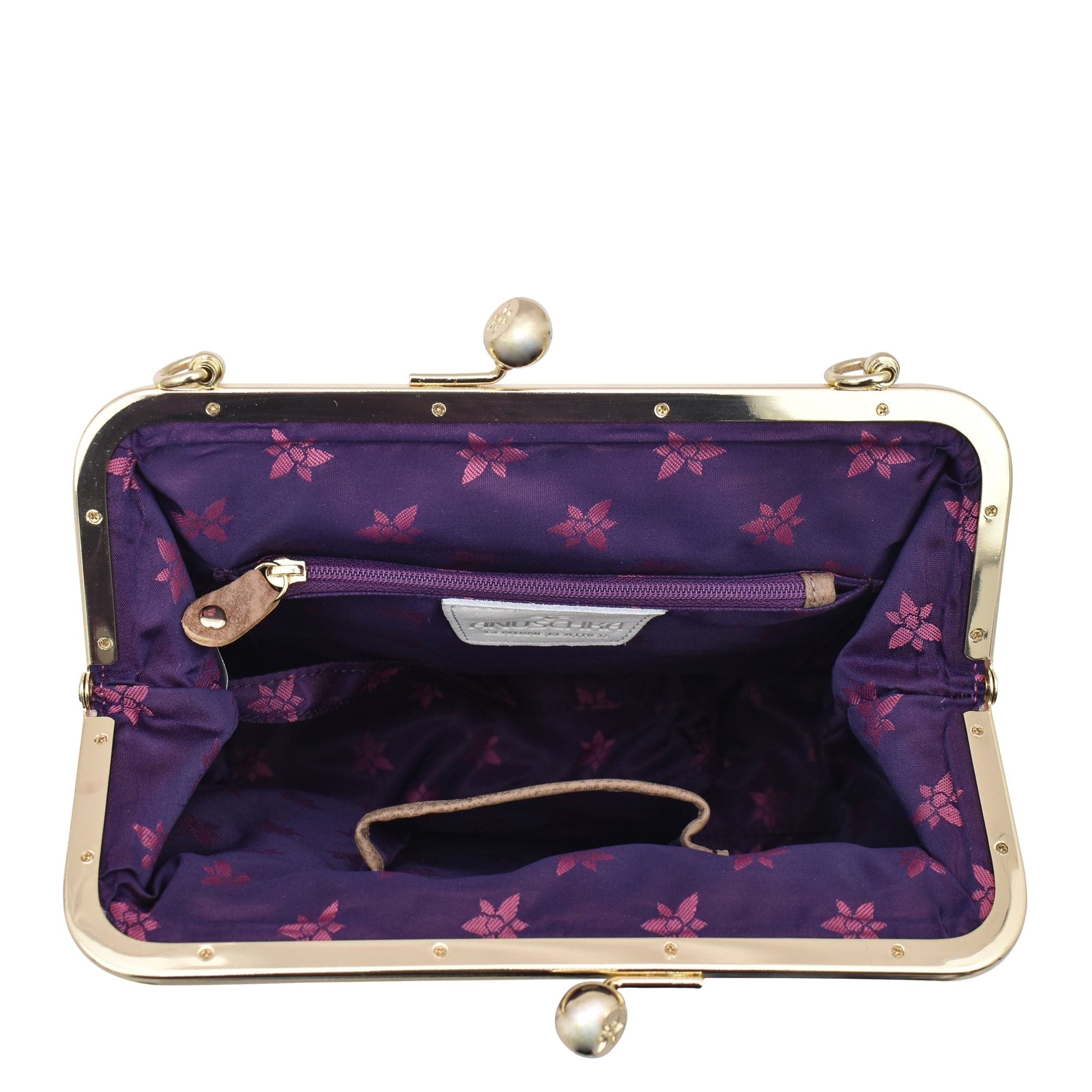 Open empty Medium Frame Crossbody - 700 with floral interior design and vintage-inspired metal clasp closure, isolated on a white background by Anuschka.