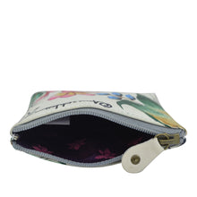 Load image into Gallery viewer, A partially open floral print leather Coin Pouch - 1031 with a visible zip entry and fabric inner lining featuring original artwork by Anuschka.
