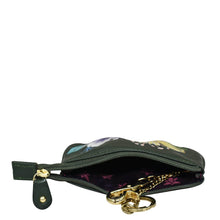 Load image into Gallery viewer, A small, partially open floral-printed leather Medium Zip Pouch - 1107 with a gold chain strap and black zipper detail, isolated on a white background by Anuschka.

