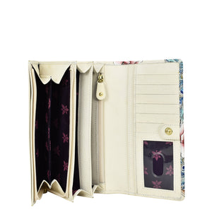 Open Anuschka Accordion Flap Wallet - 1112 showcasing compartments and floral interior design with RFID protection.