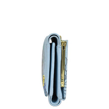 Load image into Gallery viewer, Side view of the RFID Blocking Small Flap French Wallet - 1138 by Anuschka, in light blue genuine leather with a gold-tone clasp and zippered compartments.
