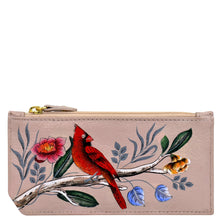 Load image into Gallery viewer, A small, beige RFID Blocking Card Case with Coin Pouch from Anuschka, crafted from genuine leather and featuring a painted design of a red bird perched on a branch with colorful flowers and leaves.
