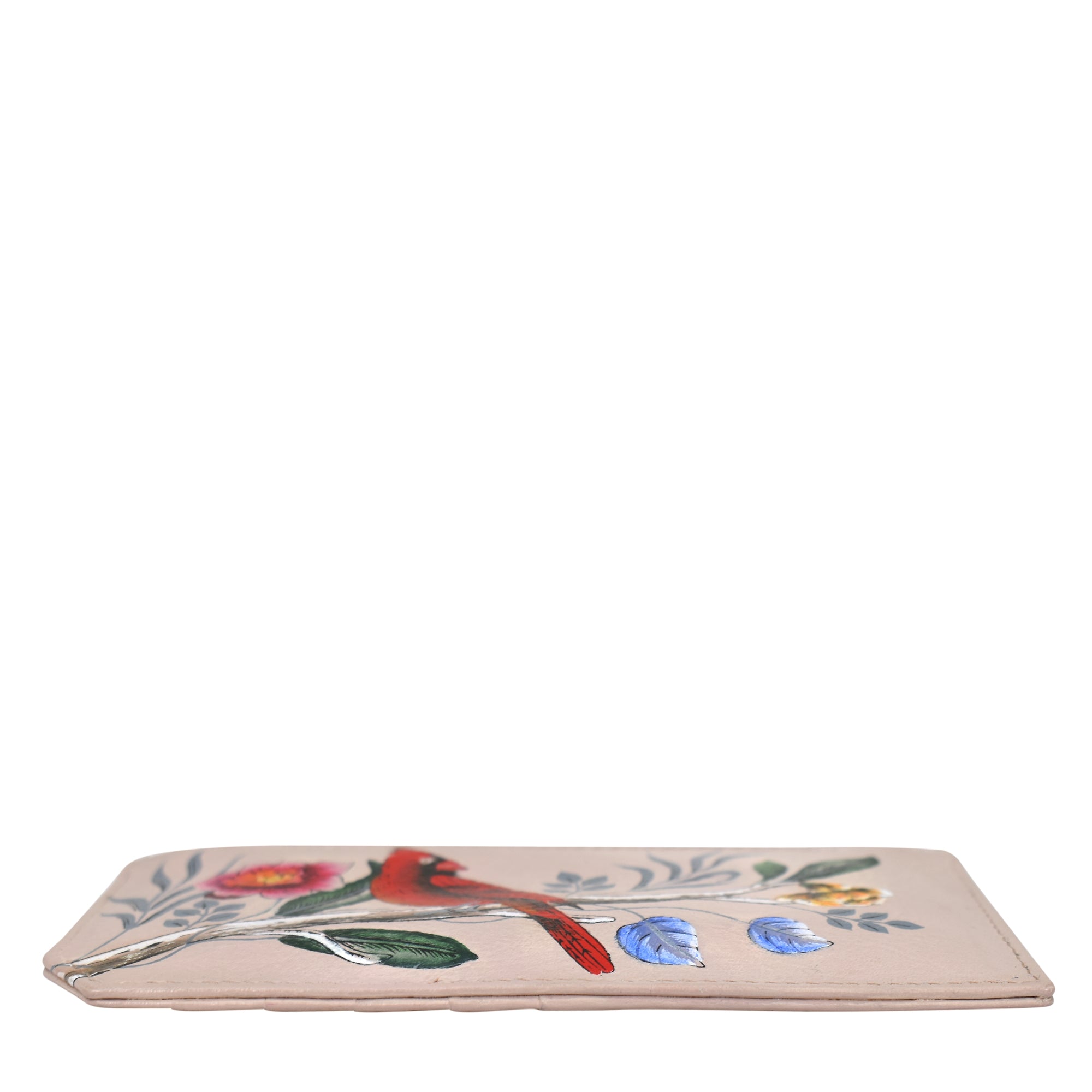 The Anuschka RFID Blocking Card Case with Coin Pouch - 1140 is a sleek, rectangular beige accessory featuring embroidered floral designs and a red bird on a branch, all crafted from genuine leather.