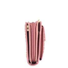 Load image into Gallery viewer, A close up of a pink Anuschka Organizer Wallet Crossbody - 1149, made of genuine leather.
