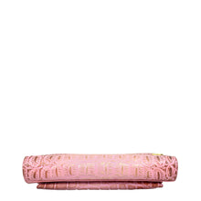 Load image into Gallery viewer, Patterned pink rolling pin resting horizontally on a white surface with a white background, akin to genuine leather Anuschka Organizer Wallet Crossbody - 1149.
