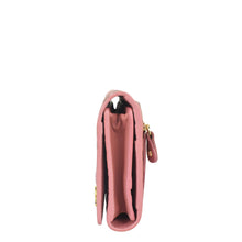 Load image into Gallery viewer, Side view of a closed pink Anuschka Three Fold Wallet - 1150 with a zipper and RFID protected card slots.
