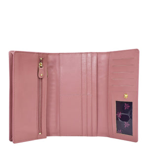 Open pink Anuschka Three Fold Wallet - 1150 with RFID protected card slots and a zipper compartment.