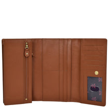 Load image into Gallery viewer, Brown Anuschka Three Fold Wallet - 1150 open showing card slots and a zipper coin pocket.

