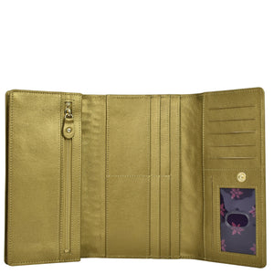 Open Anuschka olive green three fold wallet displaying card slots, a zipper compartment, and an RFID protected decorative floral panel.