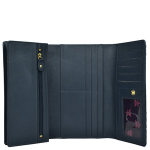 Open navy blue Anuschka Three Fold Wallet - 1150 with multiple RFID protected card slots and a zipper compartment.