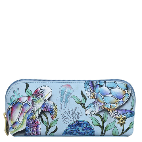 A genuine leather Medium Zip-Around Eyeglass/Cosmetic Pouch - 1163 with a sea turtle and marine life design by Anuschka.