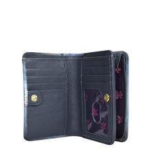 Load image into Gallery viewer, Open Anuschka Two-Fold Small Organizer Wallet - 1166 with card slots and a floral interior design.
