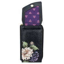 Load image into Gallery viewer, A Crossbody Phone Case - 1173 from Anuschka with a floral design, RFID card holders, and a purple interior.
