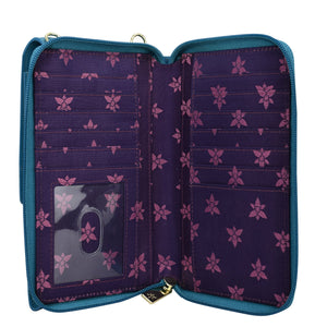 Open floral-patterned Anuschka genuine leather wallet with multiple card slots and a clear ID window.