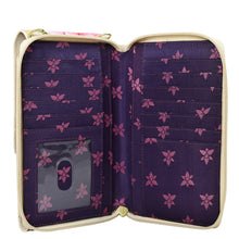 Load image into Gallery viewer, Open empty Anuschka Crossbody Phone Case - 1173 with floral pattern, clear ID window, and RFID protection.
