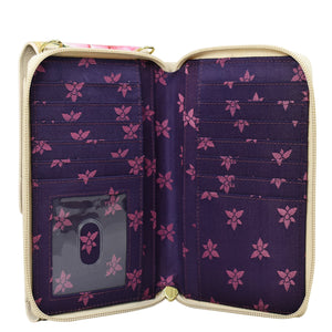Open empty Anuschka Crossbody Phone Case - 1173 with floral pattern, clear ID window, and RFID protection.