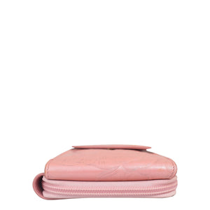A pink, closed Crossbody Phone Case - 1173 with RFID card holders isolated on a white background by Anuschka.