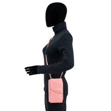 Load image into Gallery viewer, Mannequin displaying a black outfit with gloves and a pink Anuschka Crossbody Phone Case - 1173 featuring a crossbody strap.
