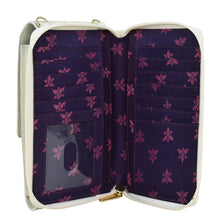 Load image into Gallery viewer, Open white Anuschka genuine leather Crossbody Phone Case - 1173 with purple floral interior, RFID card holders, and phone compartment.
