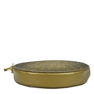 Golden-colored, decorative skillet with embossed pattern and hand-painted artwork on a white background by Anuschka featuring the Round Coin Purse - 1175.