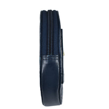 Load image into Gallery viewer, Side view of a closed blue Anuschka genuine leather Round Coin Purse - 1175 with a zipper.
