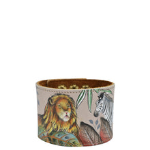 Load image into Gallery viewer, Anuschka Hand-painted Leather Adjustable Wrist Band - 1176 with printed lion and zebra designs against a pale background.
