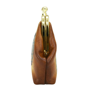 A side view of a closed brown leather Clasp Pouch With Key Fobs - 1177 from Anuschka, isolated on a white background.