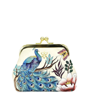 Elegant Anuschka clutch purse decorated with a colorful peacock and floral design, exuding vintage charm.