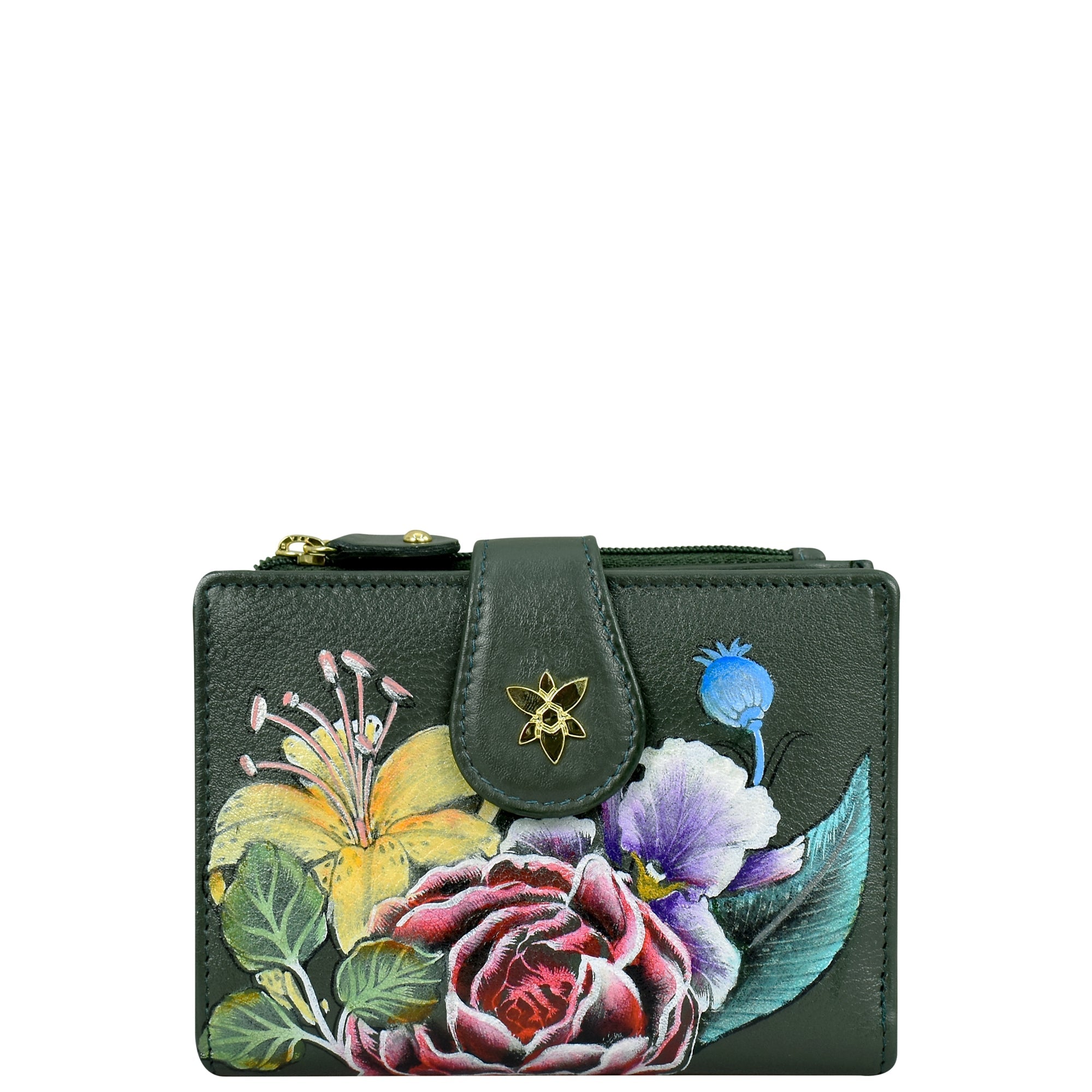 The Anuschka Two Fold Organizer Wallet - 1178 is crafted from green leather and adorned with a hand-painted floral design, showcasing vibrant flowers in red, yellow, and purple hues. This compact wallet features a snap closure with a gold-tone emblem, combining elegance and functionality.