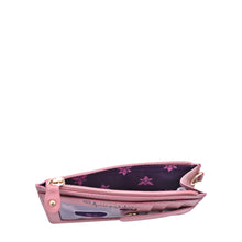Load image into Gallery viewer, Pink Anuschka Card Holder with Wristlet - 1180 with floral interior design open and showing inside compartment.
