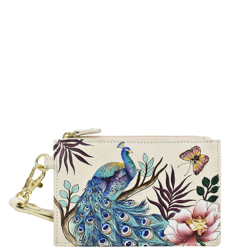A Anuschka Card Holder with Wristlet - 1180 with RFID protection and a printed design featuring a peacock and floral elements.
