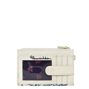 A Anuschka Card Holder with Wristlet - 1180 with RFID protection and a printed design featuring a peacock and floral elements.