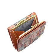 The Anuschka Two Fold French Wallet - 1181, crafted from genuine leather and adorned with vibrant hand-painted designs and a gold clasp, is slightly open to display its floral-patterned interior. Inside are eleven card holders for all your essentials.