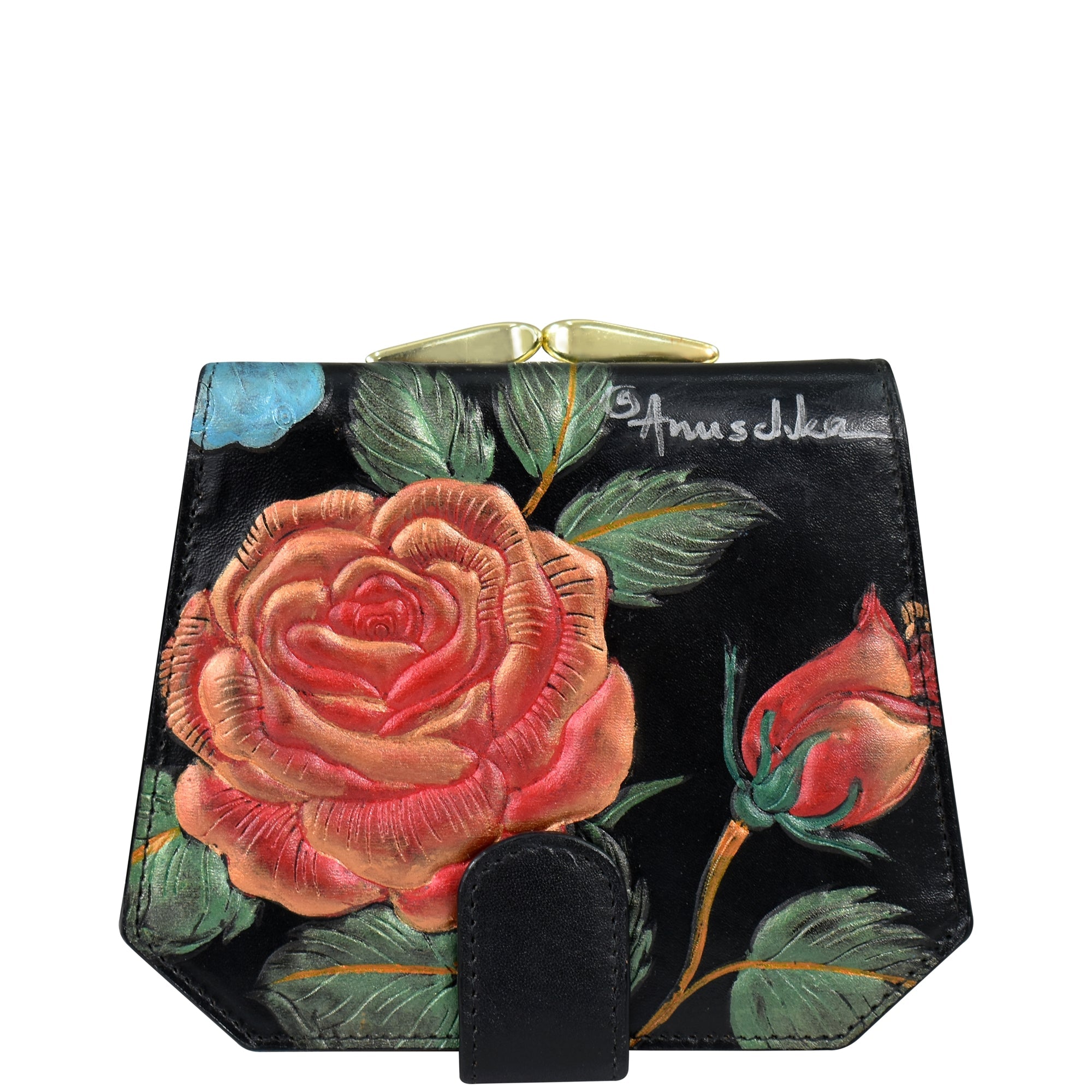 A genuine leather wallet from Anuschka, featuring a gold clasp, is adorned with hand-painted red roses and green leaves. The name "Anuschka" is elegantly written in white on the upper right side of the black Two Fold French Wallet - 1181.