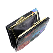 The Anuschka Two Fold French Wallet - 1181 is a genuine leather wallet adorned with floral designs, featuring a gold French clasp, multiple compartments, and a convenient coin pocket.