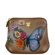 The Anuschka Multi Purpose Zip Pouch - 1182 is a genuine leather slim zip pouch in a brown hue, featuring a gold flower ornament and an exquisite painted design of colorful flowers and a butterfly. This minimalist essential is perfect for keeping your valuables organized with style.