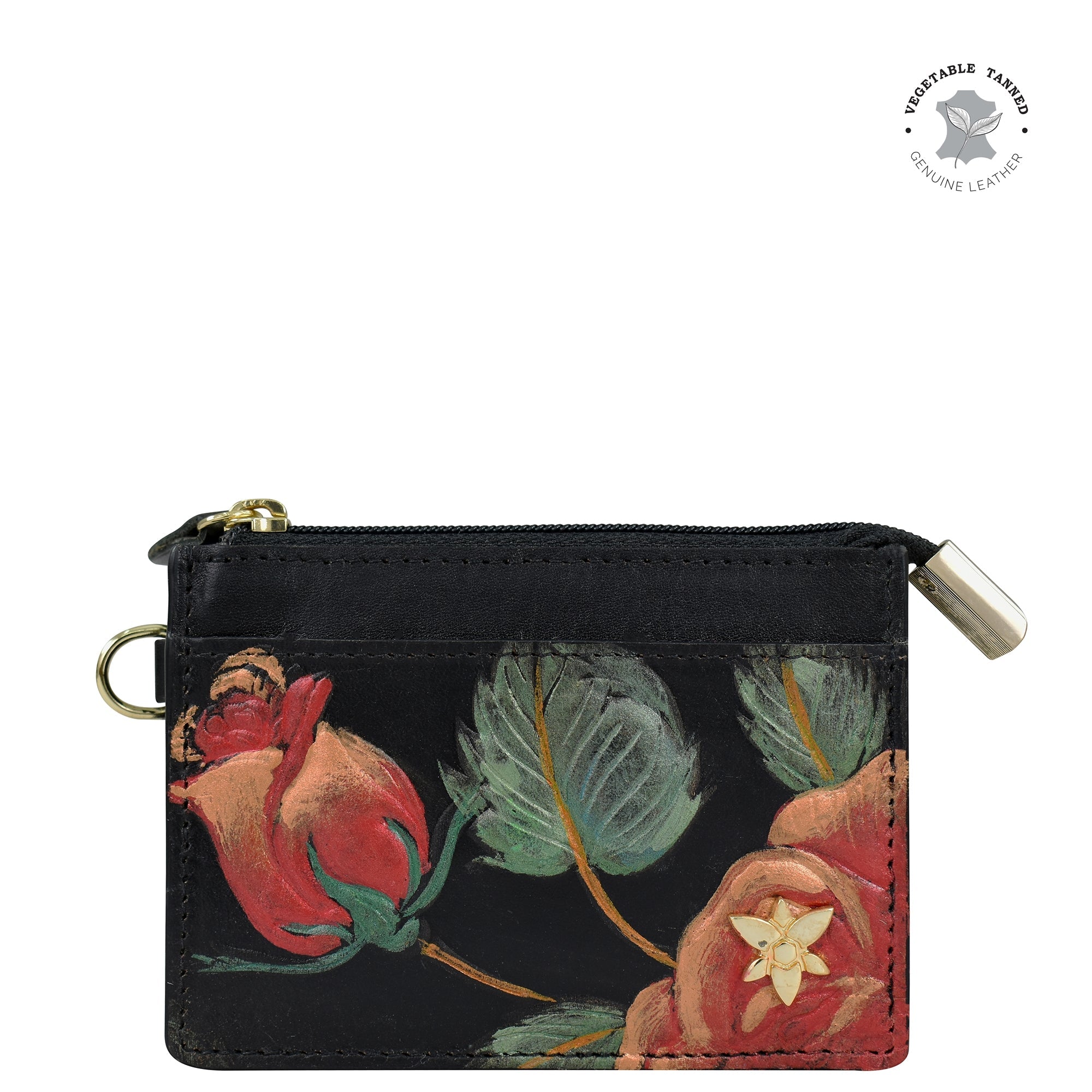 Introducing the CARD CASE - 1183 from Anuschka, a charming small leather coin purse adorned with an exquisite floral design showcasing red roses and green leaves. It features a convenient zipper closure and a sturdy metal keyring attachment. The top right corner is stamped with "Sustainable Tanned Genuine Leather," underscoring its commitment to sustainability. This genuine leather accessory is perfect for those who value both style and eco-conscious products.