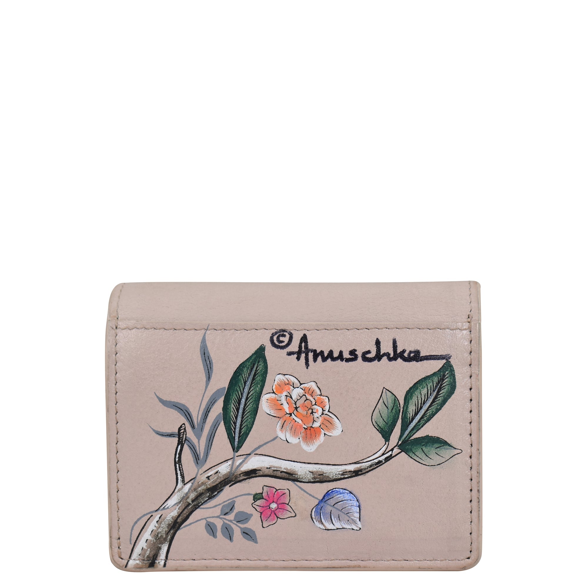 The Card Organizer Wallet - 1184 by Anuschka is a beige, genuine leather wallet adorned with hand-painted floral and branch artwork, and embossed with the word "Anuschka" in black. It also includes a convenient credit card holder.