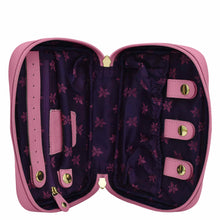 Load image into Gallery viewer, Open Anuschka pink leather trim travel jewelry organizer with empty compartments, partition pocket, and floral interior design.
