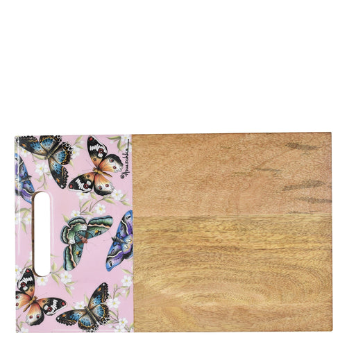 A Anuschka wooden and enamel cutting board with butterflies on it, designed to serve as an elegant display.